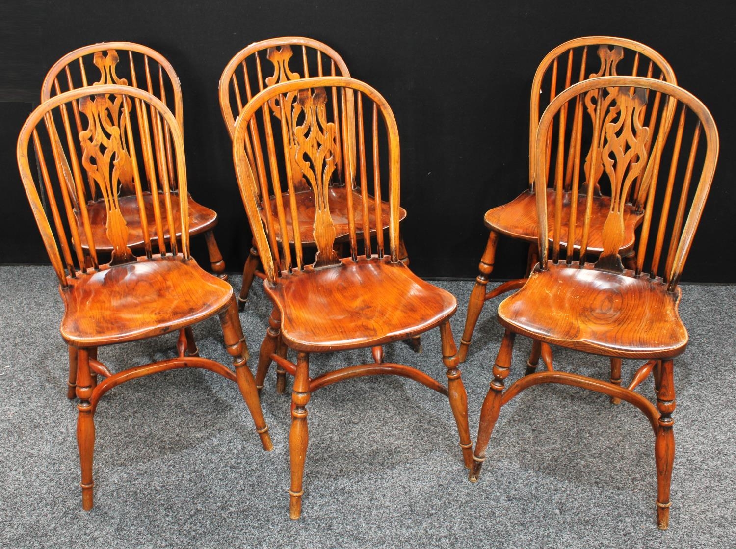 A set of six oak and elm Windsor type dining side chairs, Crinoline...