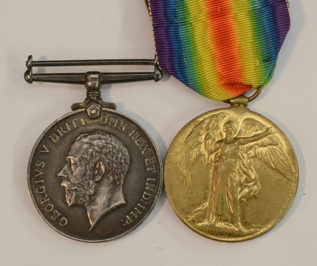 Medals, World War I, a pair, British War and Victory, named to 60803 Gnr A...