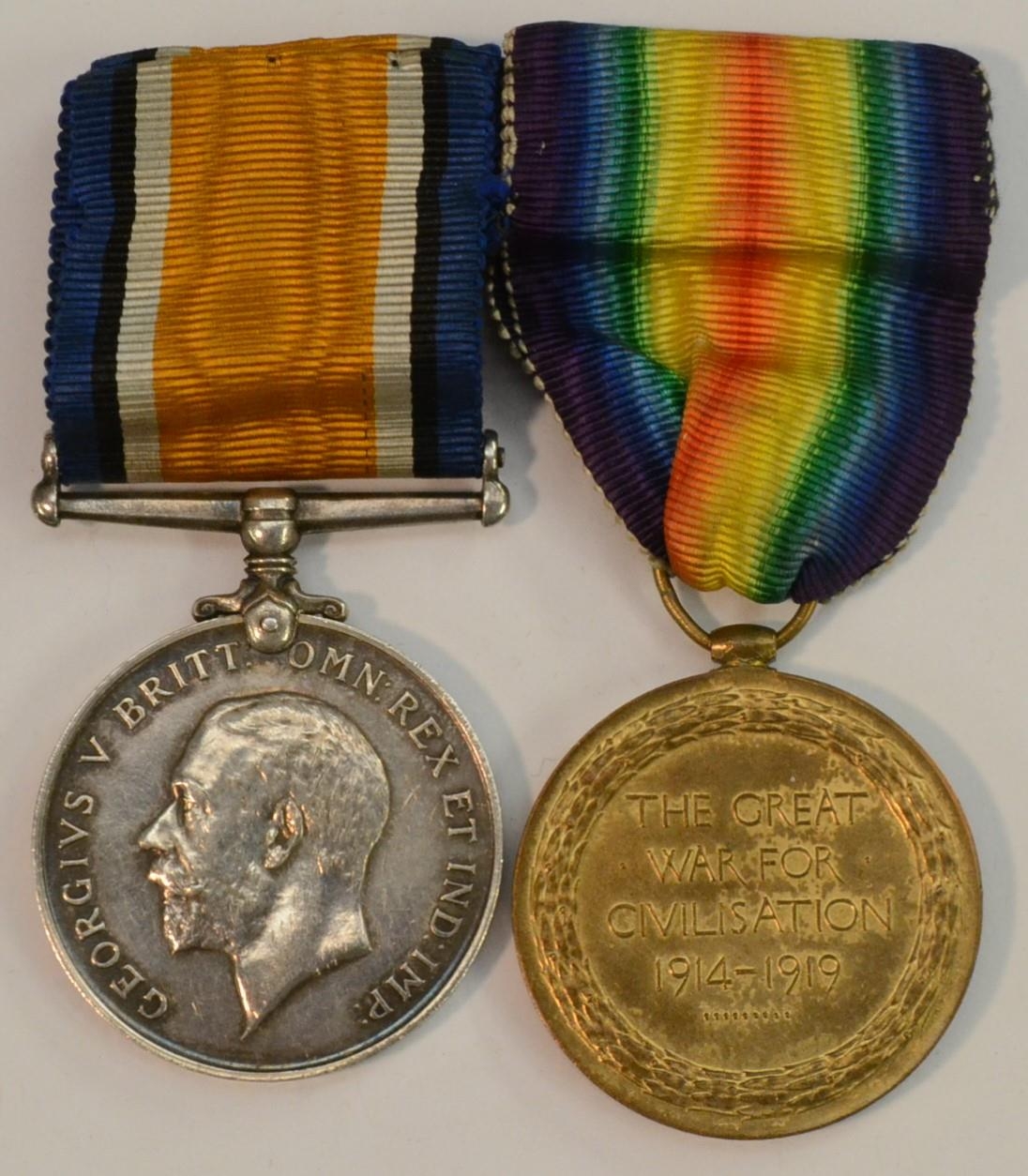 Medals, World War I, a pair, British War and Victory, named to S4-129704...