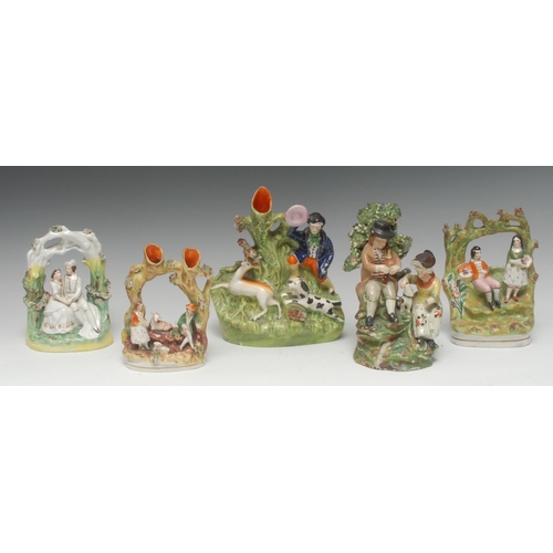 37 - A Wood type figure group, a couple, he with bagpipes, she with a dog, before bocage, c.1800;  a Staf... 