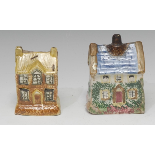7 - A 19th century cottage money box, with blue roof, sponged in green and pink, 10.5cm high, c.1820;  a... 