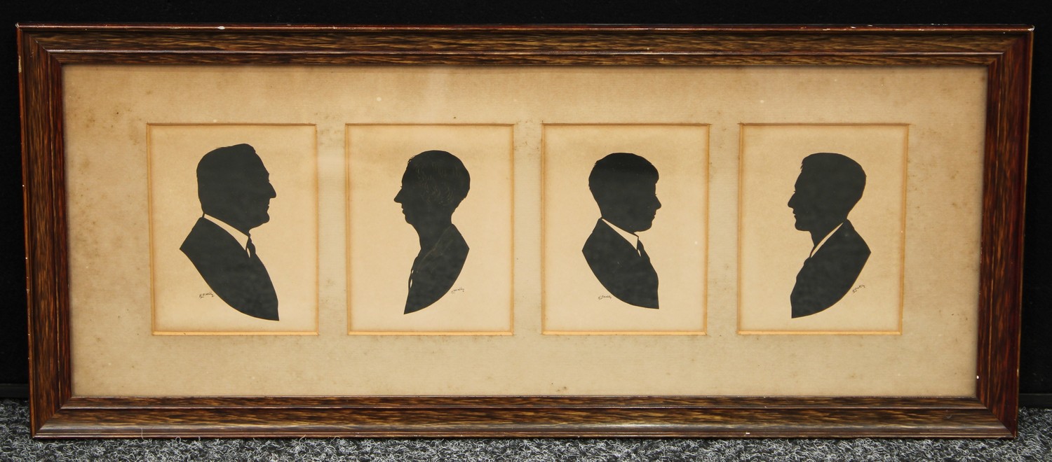 A mid 20th century family group of silhouettes, The Ayre Family, Ernest...