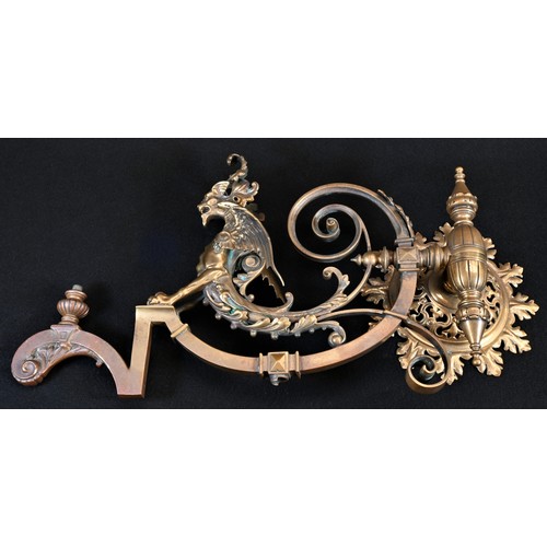 5031 - A 19th century gilt brass gas light wall bracket, cast in the Renaissance Revival taste with a drago... 