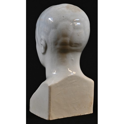 5055 - A 19th century phrenology head, quite plain and completely glazed in white, 19cm high