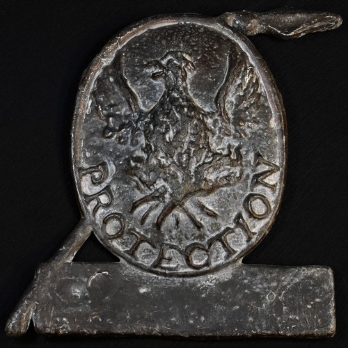 5042 - A lead fire mark, cast with a phoenix and inscribed 'Protection', 21cm high, 19cm wide