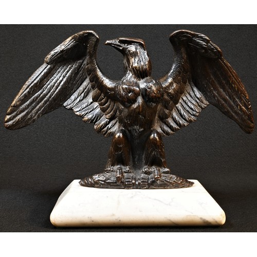 5023 - A 19th century dark patinated bronze desk model, of an Imperial eagle, marble base, 24cm wide