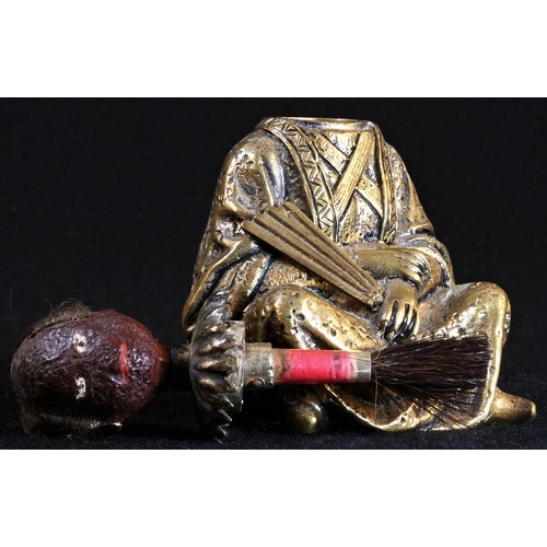 5016 - A 19th century Chinoiserie gilt bronze and composition novelty glue pot, cast as a Chinese man, seat... 