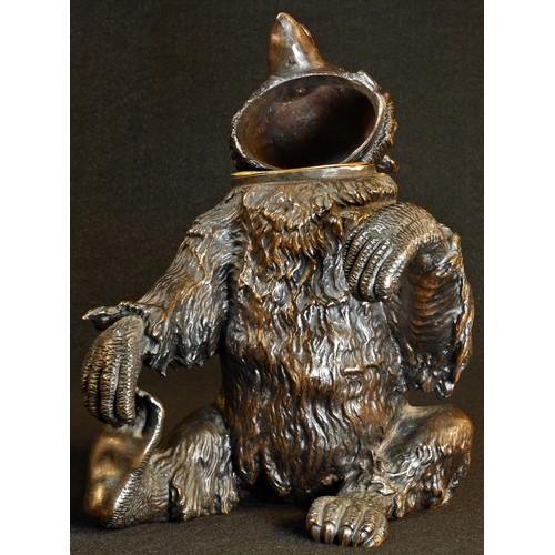 5041 - A 19th century Italian dark patinated bronze novelty table snuff, cast as a bear, seated scratching ... 