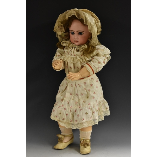 A Tete Jumeau Bisque Head Bebe French Circa 10 With Fixed Blue Glass Paper Weight Eyes Painte