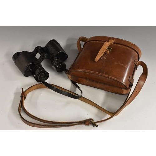 3012 - A pair of World War Two Air Ministry binoculars, by Wray of London, numbered 6E/293 above AM crowned... 