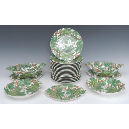 13 - A 19th century Spode dessert service, each piece printed and painted overall with fruiting vine in g... 