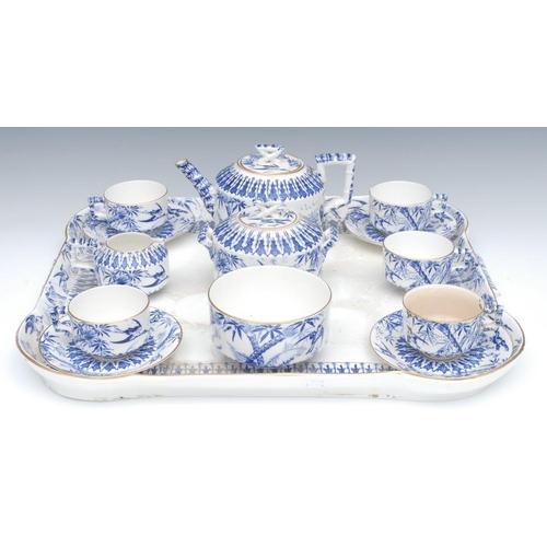 24 - A late 19th century Staffordshire tea service, comprising teapot, sugar bowl, slop bowl, milk jug, f... 