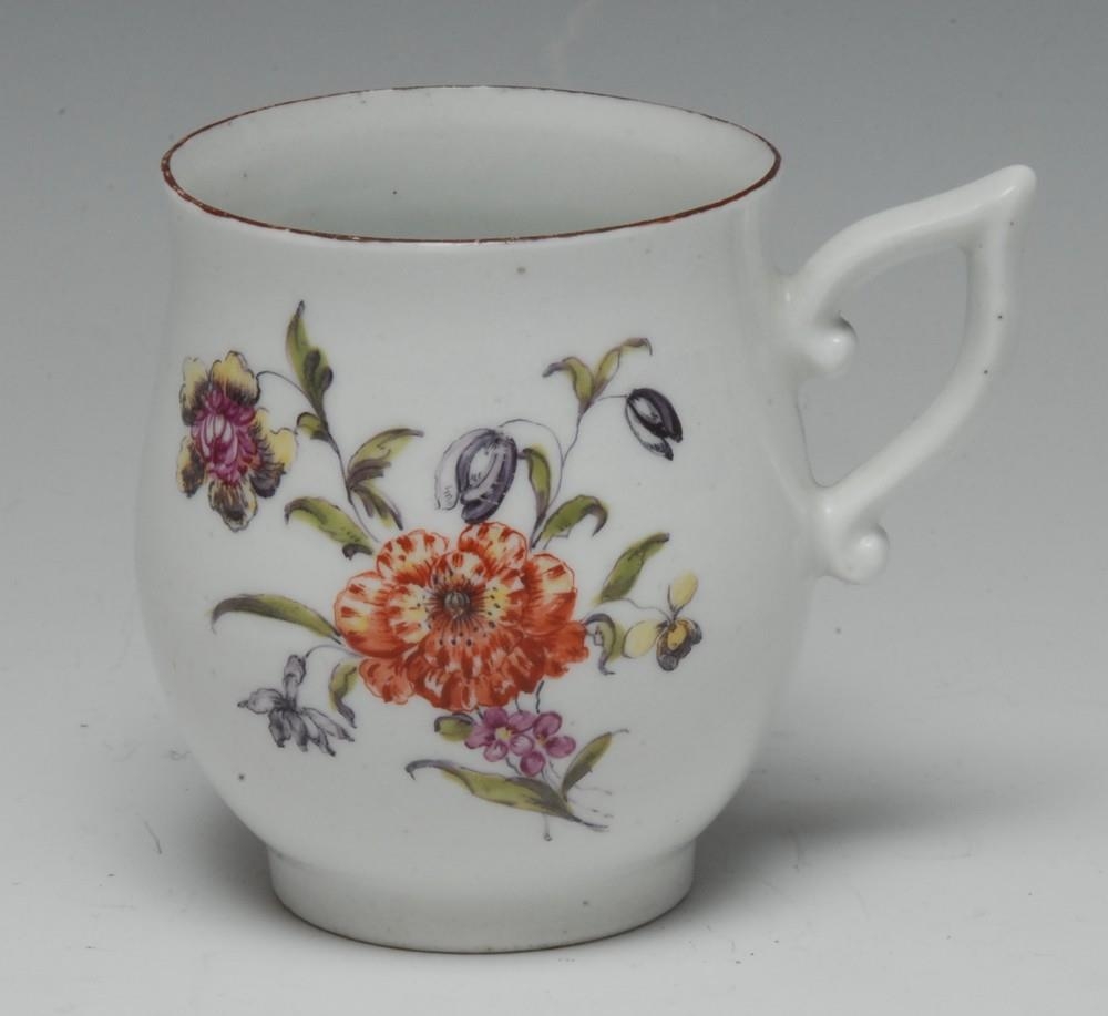An early Derby bell-shaped coffee cup, painted in the manner of the...