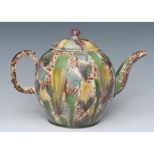41 - A Whieldon globular teapot, dripped and splashed in green, yellow and manganese, crabstock handles, ... 