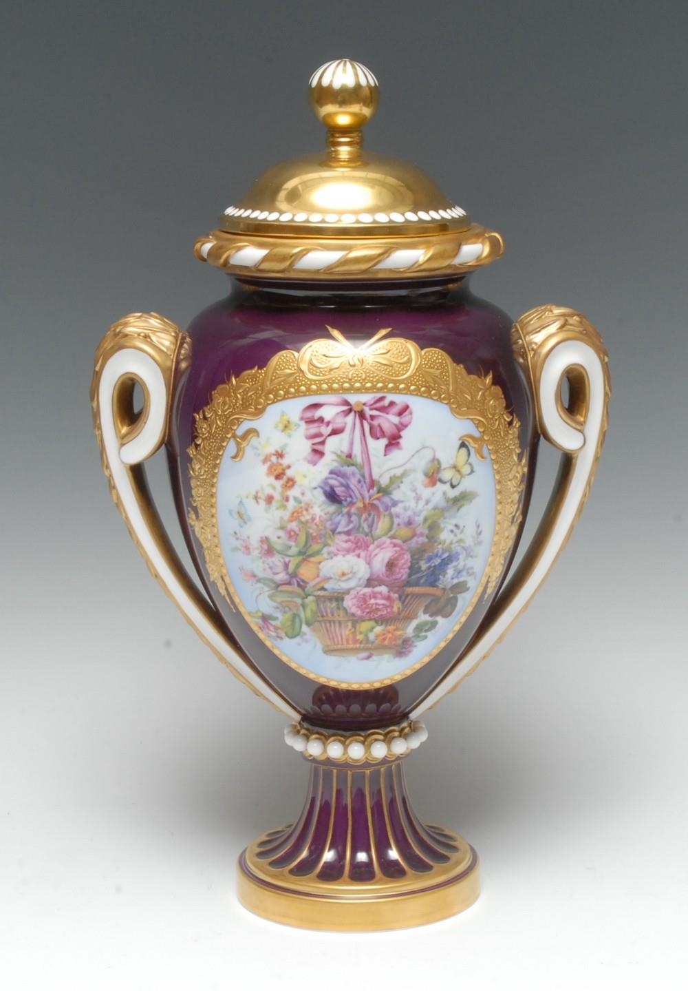A Lynton porcelain two-handled ovoid pedestal vase and cover, of Sèvres...