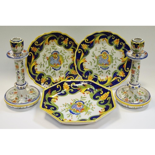 15 - A pair of early 19th century Delft candlesticks, an octagonal bowl and a pair of cabinet plates