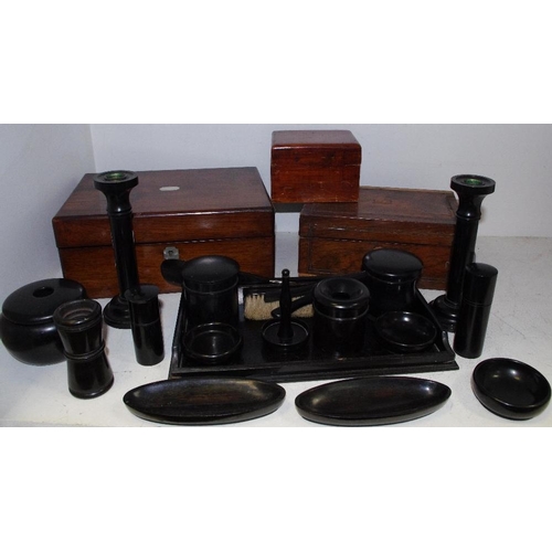 43 - Boxes & objects - an ebony dressing table set comprising tray, various pots and covers, dishes, cand... 