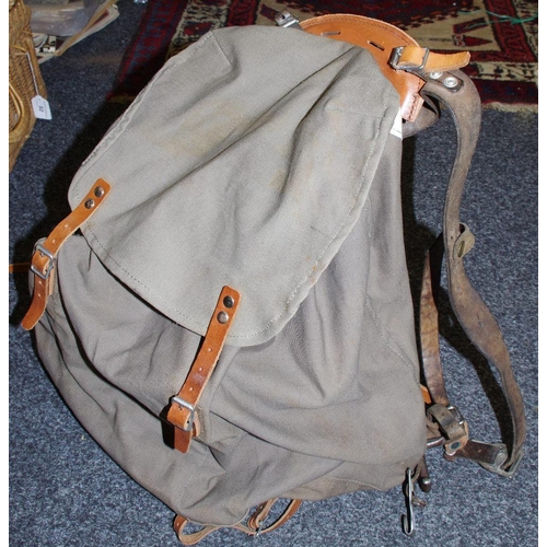 56 - A vintage leather & canvas mountaineering rucksack with metal frame c1950's