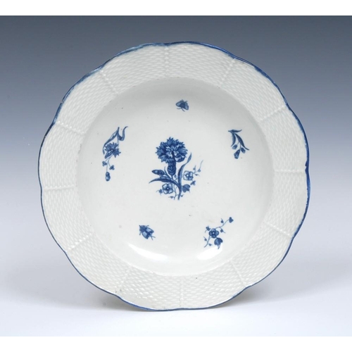 62 - A Worcester The Gilliflower pattern circular plate, ozier-moulded border, printed in blue with flora... 
