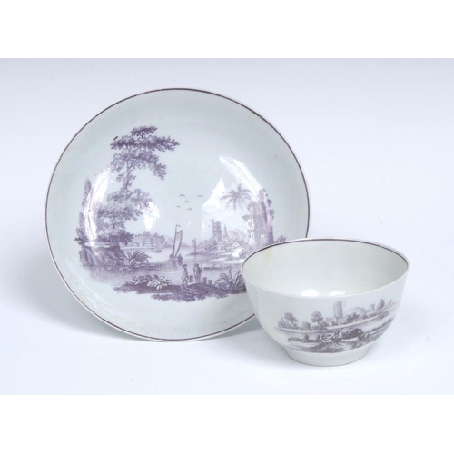 63 - A Worcester tea bowl and saucer, printed in purple after Robert Hancock, with The Signal Tower, a ha... 