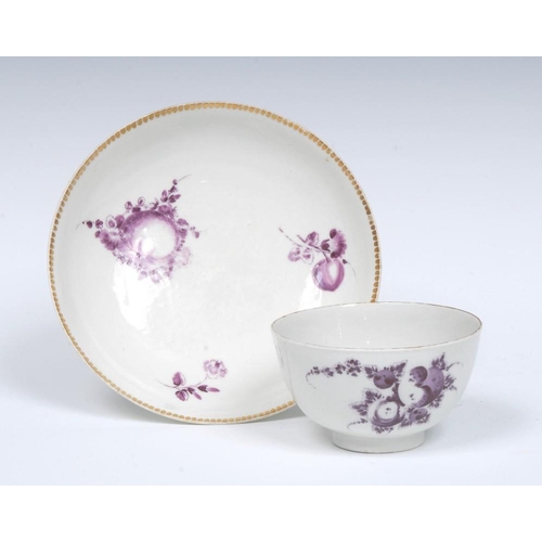 64 - A Worcester tea bowl and saucer, decorated in the James Giles style with cut and whole fruit in purp... 