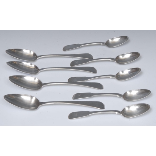 35 - A set of four George III silver table spoons, Thomas Wallis II, London 1804; a composed set of five ... 
