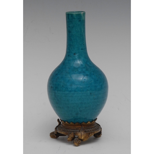 20 - A 19th century ormolu mounted Chinese monochrome bottle vase, glazed in mottled tones of turquoise, ... 