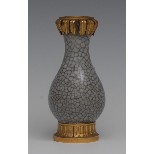 30 - An ormolu mounted Chinese crackle glazed celadon miniature ovoid vase, 9.5cm high, 19th century
