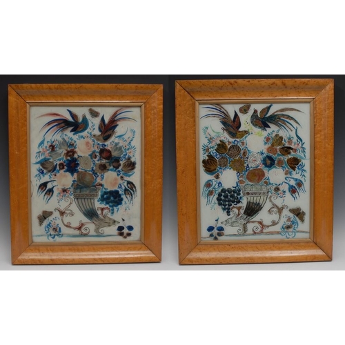 78 - A pair of early 19th century reverse paintings on glass, colourfully worked with doves, butterflies ... 