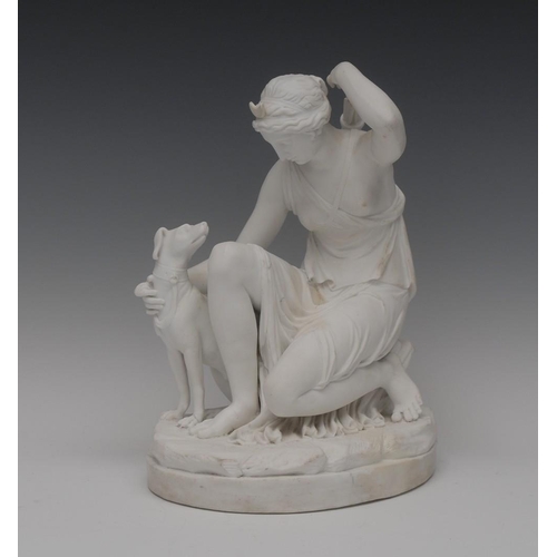 41 - A Parian figure, Diana, kneeling, with her hound getting  an arrow out of her quiver, oval base, 27c... 