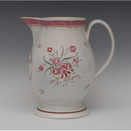 7 - A large creamware jug, inscribed in red Success to Trade, the sides with peonies and flowerheads, in... 