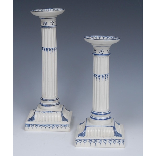 2 - A Wedgwood Pearlware candlestick, dished sconce, fluted column, spreading square fluted  base, leave... 