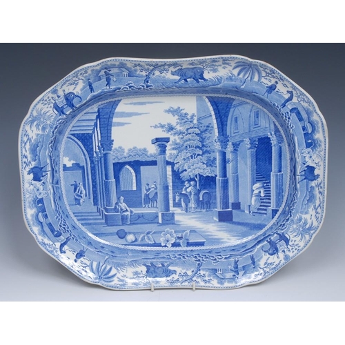 51 - A Spode Caramanian Series oval meat plate, transfer printed in in tones of blue Antique Fragments at... 