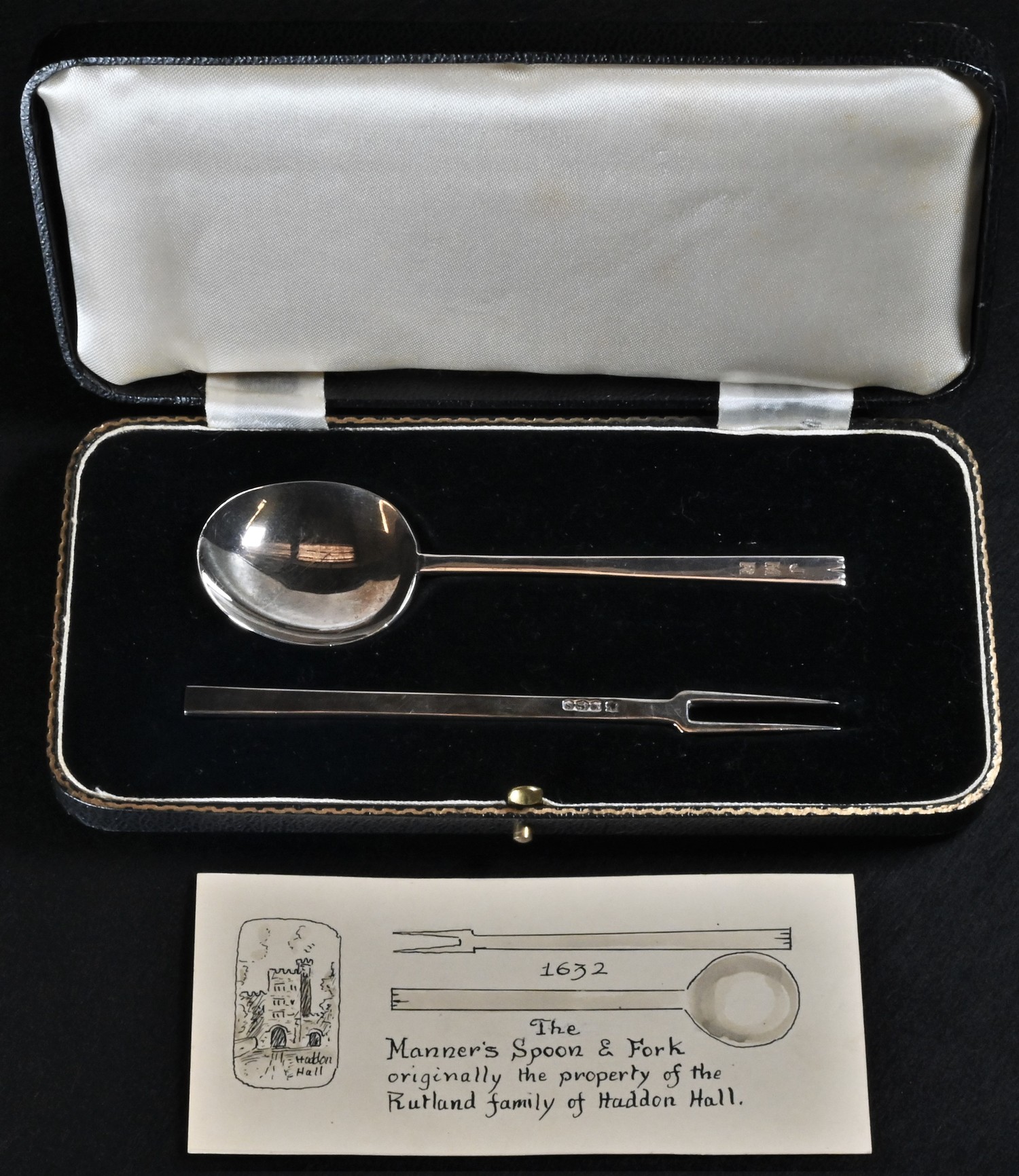 A George V silver facsimile 17th century spoon and fork, The Manners Spoon...