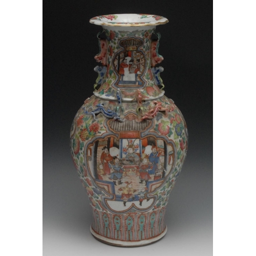5 - A Cantonese porcelain baluster vase, painted in the Famille Rose palette with soldiers in battle, to... 