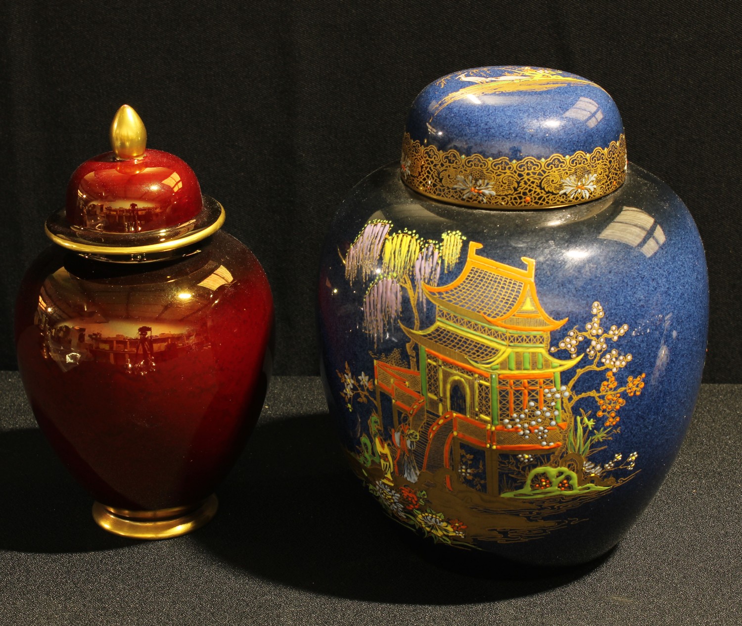 A Carlton Ware Rouge Royale ginger jar and cover, in ruby lustre glaze...
