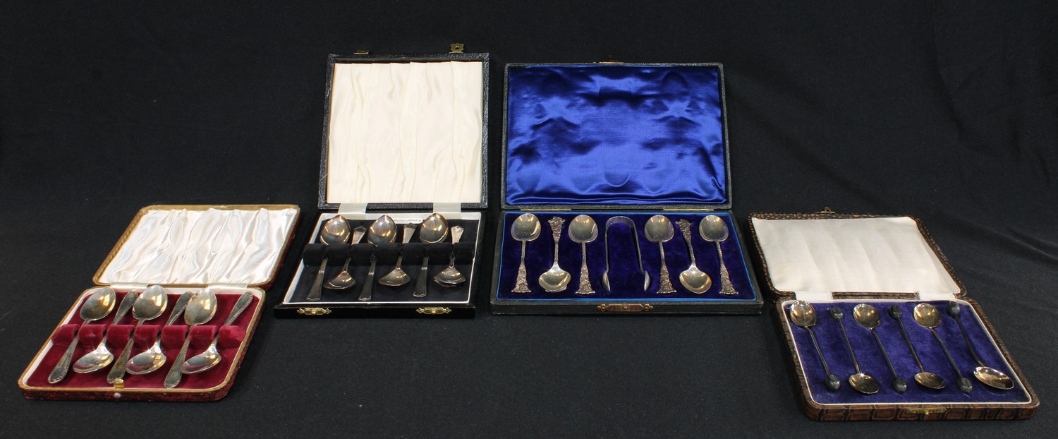 A set of six silver teaspoons, London 1903, a pair of associated silver...
