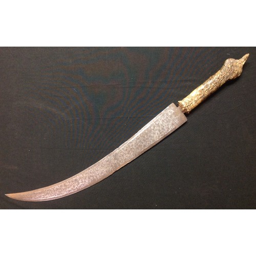 50 - An African dagger, probably Sudanese, 35cm curved blade, Crocodile skin covered grip, 50cm long over... 