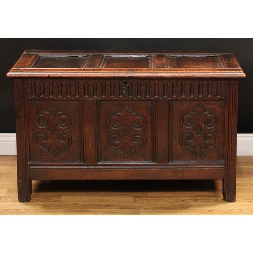 49 - A late 17th/early 18th century oak three panel blanket chest, of small proportions, hinged cover, nu... 