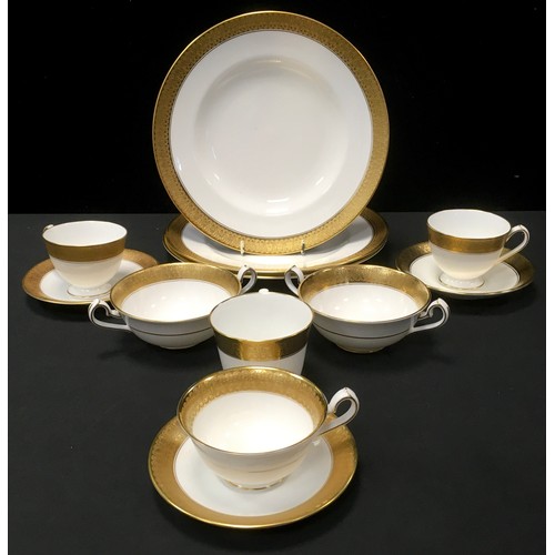 3 - Three Royal Crown Derby teacups and saucers, with tooled gold band, printed mark;  similar plates an... 