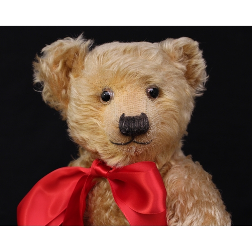 2020 - A 1930's Chiltern golden mohair jointed teddy bear, glass eyes with remains of brown painted backs, ... 
