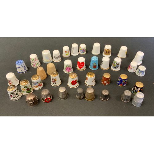 39 - Thimbles - a Charles Horner silver thimble, Chester 1895;  others Birmingham 1930;  others ceramic, ... 