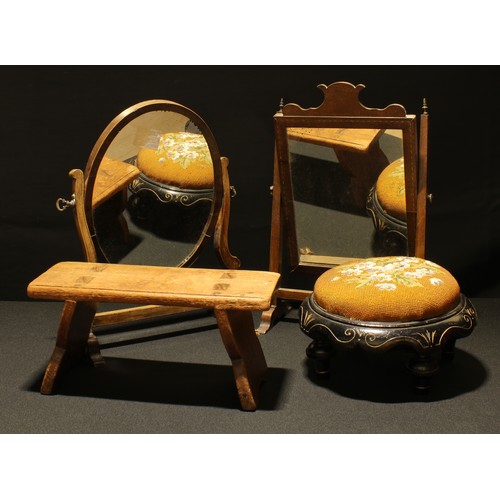38 - A George III mahogany dressing glass, c.1800; another; a Victorian ebonised footstool, c.1880; a ver... 