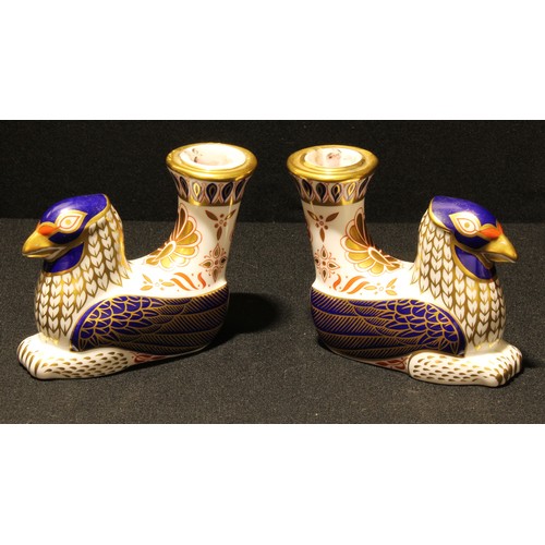 40 - A pair of Royal Crown Derby Mythical Creatures candle holders, Griffins, first quality