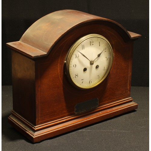 43 - An Edwardian mahogany inlaid domed mantel clock, white enamel dial with Arabic numerals, twin windin... 