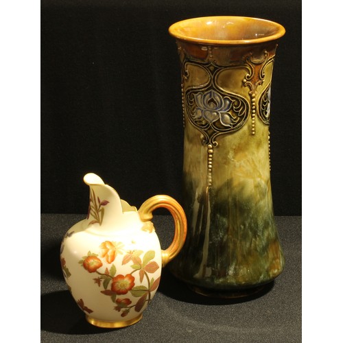44 - A Royal Doulton 'Art Nouveau' style tube lined vase, 24cm high and a Royal Worcester blush ivory jug... 