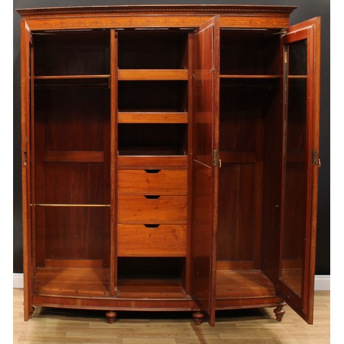10 - A Sheraton Revival satinwood and marquetry two-piece bedroom suite, comprising wardrobe and dressing... 
