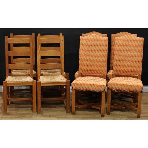 16 - A set of four contemporary oak dining chairs, drop-in rush seats, 107cm high, 47cm wide, the seat 36... 