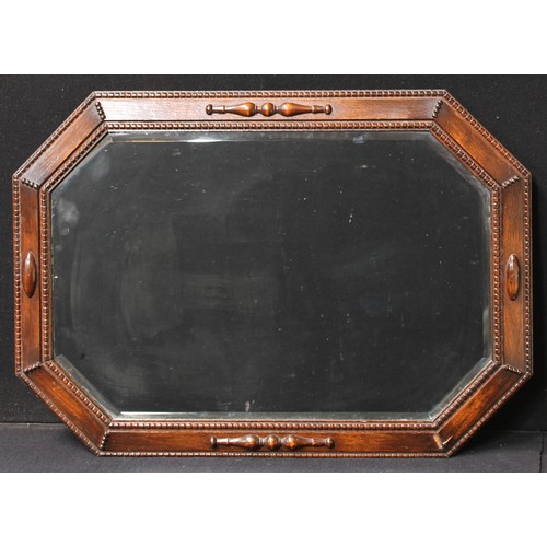 19A - A Jacobean Revival oak wall mirror, c.1935