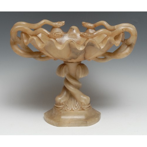 3004 - A 19th century alabaster tazza, the oval bowl with wavy rim entwined with snakes, the canted triform... 